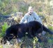 Happy hunter with nice black bear in British Columbia