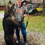 Happy hunter with his Trophy Boar, trophy hog hunts