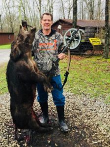 Happy hunter with his Trophy Boar, trophy hog hunts